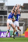 25 June 2017; Padraig Faulkner, left, and Niall Clerkin of Cavan in action against David Hanlon of Offaly  during the GAA Football All-Ireland Senior Championship Round 1B match between Offaly and Cavan at O'Connor Park in Tullamore, Co. Offaly. Photo by Ramsey Cardy/Sportsfile