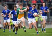 25 June 2017; Niall Clerkin of Cavan is tackled by Brian Darby of Offaly during the GAA Football All-Ireland Senior Championship Round 1B match between Offaly and Cavan at O'Connor Park in Tullamore, Co. Offaly. Photo by Ramsey Cardy/Sportsfile