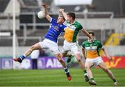 25 June 2017; David Hanlon of Offaly in action against James McEnroe of Cavan during the GAA Football All-Ireland Senior Championship Round 1B match between Offaly and Cavan at O'Connor Park in Tullamore, Co. Offaly. Photo by Ramsey Cardy/Sportsfile