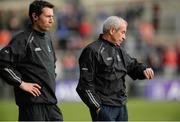 25 June 2017; Fermanagh Manager Peter McGrath, right, looking at his watch near the end of the game as Raymond Johnston, assistant manager looks on during the GAA Football All-Ireland Senior Championship Round 1B match between Armagh and  Fermanagh at the Athletic Grounds in Armagh. Photo by Oliver McVeigh/Sportsfile