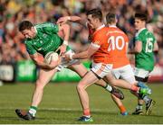 25 June 2017; Eoin Donnelly of Fermanagh in action against Ciaran O'Hanlon of Armagh during the GAA Football All-Ireland Senior Championship Round 1B match between Armagh and  Fermanagh at the Athletic Grounds in Armagh. Photo by Oliver McVeigh/Sportsfile