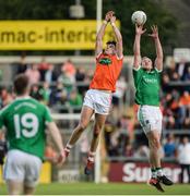 25 June 2017; Niall Grimley of Armagh  in action against Lee Cullen of Fermanagh  during the GAA Football All-Ireland Senior Championship Round 1B match between Armagh and  Fermanagh at the Athletic Grounds in Armagh. Photo by Oliver McVeigh/Sportsfile