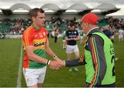 25 June 2017; Seán Gannon of Carlow is congratulated by backroom staff memeber Sean Reilly following their side's victory during the GAA Football All-Ireland Senior Championship Round 1B match between London and Carlow at McGovern Park in Ruislip, London. Photo by Seb Daly/Sportsfile