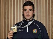 25 June 2017; Joe Ward of Ireland with his gold medal at Dublin Airport as Team Ireland arrive home from the European Championships at Dublin Airport in Dublin. Photo by Eóin Noonan/Sportsfile