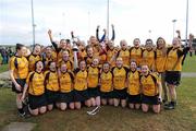 19 February 2012; Dublin City University captain Laura Twomey lifts the Purcell Cup as her team-mates celebrate. 2012 Purcell Cup Final, Dublin City University v Queen's University Belfast, Waterford IT, Waterford. Picture credit: Matt Browne / SPORTSFILE