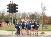 19 February 2012; The Dublin team wait at the traffic lights to cross the road from the warm-up pitch to the match venue. Bord Gais Energy Ladies National Football League, Division 1, Round 3, Dublin v Cork, Ballyboden St. Enda's GAA Club, Ballyboden, Dublin. Picture credit: Pat Murphy / SPORTSFILE