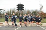19 February 2012; The Dublin team cross the road from the warm-up pitch to the match venue. Bord Gais Energy Ladies National Football League, Division 1, Round 3, Dublin v Cork, Ballyboden St. Enda's GAA Club, Ballyboden, Dublin. Picture credit: Pat Murphy / SPORTSFILE