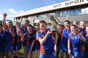 19 February 2012; Mary Immaculate Limerick captain Mairead Ryan lifts the Fr. Meachair Cup as her team-mates celebrate. 2012 Fr. Meachair Cup Final, Mary Immaculate Limerick v St. Patrick's College Drumcondra, Waterford IT, Waterford. Picture credit: Matt Browne / SPORTSFILE