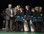 18 February 2012; The Crecora GAA Club, Co. Limerick, team of Aisling Coughlin, Orla Byrnes, Olive Wixsted, Eimear Mahon, Caoimhe Sheehan, Amy O'Connor, Fiona Hogan, and Emer Kennedy, arrive to collect the cup and medals from Paddy Naughton, Cathaoirleach, Comhairle Connacht, and Des Maguire, Cathaoirleach, Coiste Scór Naisúnta, after winning the 'Figure Dancing' competition during the All-Ireland Scór na nÓg Final 2012. Royal Theatre & Events Centre, Castlebar, Co. Mayo. Picture credit: Ray McManus / SPORTSFILE
