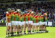 25 June 2017; The Carlow team during the National Anthem ahead of the GAA Hurling All-Ireland Senior Championship Preliminary Round match between Laois and Carlow at O'Moore Park in Portlaoise, Co. Laois. Photo by Ramsey Cardy/Sportsfile