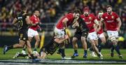 27 June 2017; Iain Henderson of the British & Irish Lions is tackled by Callum Gibbins, left, and Leni Apisai of of the Hurricanes during the match between Hurricanes and the British & Irish Lions at Westpac Stadium in Wellington, New Zealand. Photo by Stephen McCarthy/Sportsfile