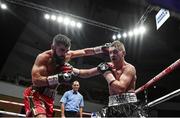 17 June 2017; Jono Carroll, left, in action against John Quigley during their IBF East/West Europe super featherweight title bout at the Battle of Belfast Fight Night at the Waterfront Hall in Belfast. Photo by Ramsey Cardy/Sportsfile