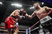 17 June 2017; Jono Carroll, left, in action against John Quigley during their IBF East/West Europe super featherweight title bout at the Battle of Belfast Fight Night at the Waterfront Hall in Belfast. Photo by Ramsey Cardy/Sportsfile