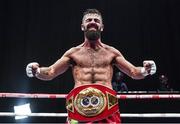 17 June 2017; Jono Carroll  celebrates defeating John Quigley during their IBF East/West Europe super featherweight title bout at the Battle of Belfast Fight Night at the Waterfront Hall in Belfast. Photo by Ramsey Cardy/Sportsfile