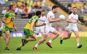 18 June 2017; Sean Cavanagh of Tyrone in action against Cian Mulligan of Donegal during the Ulster GAA Football Senior Championship Semi-Final match between Tyrone and Donegal at St Tiernach's Park in Clones, Co. Monaghan. Photo by Oliver McVeigh/Sportsfile