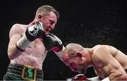 17 June 2017; Paddy Barnes, left, in action against Silvio Olteanu during their WBO European flyweight title bout Photo by Ramsey Cardy/Sportsfile
