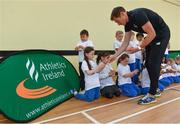 30 June 2017;  Former international athlete David Gillick presents wristbands to Senior Infant Pupils from Holy Child National School following the Athletics Ireland Fit4Class at Holy Child National School in Whitehall, Dublin. Photo by Sam Barnes/Sportsfile