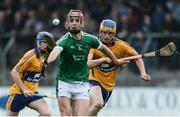 28 June 2017; Dan Minehan of Limerick in action against Sean Crowley, left, and Lee Brack of Clare during the Electric Ireland Munster GAA Hurling Minor Championship semi-final match between Clare and Limerick at Cusack Park in Ennis, Co. Clare. Photo by Diarmuid Greene/Sportsfile