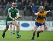 28 June 2017; Dan Minehan of Limerick in action against Lee Brack of Clare during the Electric Ireland Munster GAA Hurling Minor Championship semi-final match between Clare and Limerick at Cusack Park in Ennis, Co. Clare. Photo by Diarmuid Greene/Sportsfile