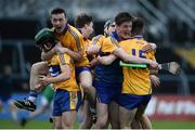 28 June 2017; Clare players, from left, Gary Cooney, Eoin Fitzgerald, Diarmuid Ryan and Breffnie Horner celebrate victory after the Electric Ireland Munster GAA Hurling Minor Championship semi-final match between Clare and Limerick at Cusack Park in Ennis, Co. Clare. Photo by Diarmuid Greene/Sportsfile