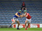 29 June 2017; Brian Turnbull of Cork in action against Kieran Breen of Tipperary during the Electric Ireland Munster GAA Hurling Minor Championship Semi-Final match between Tipperary and Cork at Semple Stadium in Thurles, Co Tipperary. Photo by Eóin Noonan/Sportsfile