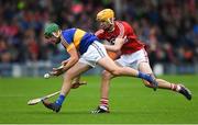 29 June 2017; Kieran Breen of Tipperary in action against Craig Hanafin of Cork during the Electric Ireland Munster GAA Hurling Minor Championship Semi-Final match between Tipperary and Cork at Semple Stadium in Thurles, Co Tipperary. Photo by Eóin Noonan/Sportsfile