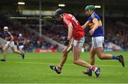 29 June 2017; Robert Downey of Cork in action against Kieran Breen of Tipperary during the Electric Ireland Munster GAA Hurling Minor Championship Semi-Final match between Tipperary and Cork at Semple Stadium in Thurles, Co Tipperary. Photo by Eóin Noonan/Sportsfile