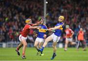 29 June 2017; Andrew Ormonde of Tipperary in action against Eoin Roche of Cork during the Electric Ireland Munster GAA Hurling Minor Championship Semi-Final match between Tipperary and Cork at Semple Stadium in Thurles, Co Tipperary. Photo by Eóin Noonan/Sportsfile