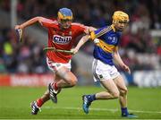 29 June 2017; Eoin Roche of Cork in action against Andrew Ormonde of Tipperary during the Electric Ireland Munster GAA Hurling Minor Championship Semi-Final match between Tipperary and Cork at Semple Stadium in Thurles, Co Tipperary. Photo by Eóin Noonan/Sportsfile