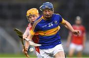 29 June 2017; Billy Seymour of Tipperary in action against James Keating of Cork during the Electric Ireland Munster GAA Hurling Minor Championship Semi-Final match between Tipperary and Cork at Semple Stadium in Thurles, Co Tipperary. Photo by Eóin Noonan/Sportsfile