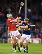 29 June 2017; Paddy Cadell of Tipperary in action against Sean O'Leary Hayes of Cork during the Electric Ireland Munster GAA Hurling Minor Championship Semi-Final match between Tipperary and Cork at Semple Stadium in Thurles, Co Tipperary. Photo by Eóin Noonan/Sportsfile