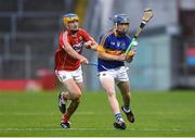 29 June 2017; Darragh Woods of Tipperary in action against Eoin Roche of Cork during the Electric Ireland Munster GAA Hurling Minor Championship Semi-Final match between Tipperary and Cork at Semple Stadium in Thurles, Co Tipperary. Photo by Eóin Noonan/Sportsfile