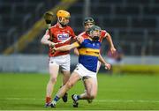 29 June 2017; Paddy Cadell of Tipperary in action against James Keating of Cork during the Electric Ireland Munster GAA Hurling Minor Championship Semi-Final match between Tipperary and Cork at Semple Stadium in Thurles, Co Tipperary. Photo by Eóin Noonan/Sportsfile
