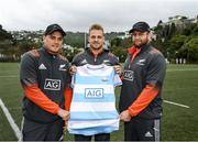 30 June 2017; Blackrock College Senior Cup Team and Development Squad got a chance to train with All Blacks stars Israel Dagg, Joe Moody and Sam Cane at Old Boys University Rugby Club in Wellington today thanks to AIG Insurance. AIG is helping to support the Dublin school’s trip to New Zealand and is also proud sponsor of the All Blacks. Pictured during the Blackrock College training session are, from left, Israel Dagg, Sam Cane and Joe Moody of the New Zealand All Blacks holding a Blackrock College jersey. Photo by Stephen McCarthy/Sportsfile