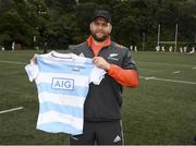 30 June 2017; Blackrock College Senior Cup Team and Development Squad got a chance to train with All Blacks stars Israel Dagg, Joe Moody and Sam Cane at Old Boys University Rugby Club in Wellington today thanks to AIG Insurance. AIG is helping to support the Dublin school’s trip to New Zealand and is also proud sponsor of the All Blacks. Pictured during the Blackrock College training session is Joe Moody of the New Zealand All Blacks holding a Blackrock College jersey. Photo by Stephen McCarthy/Sportsfile