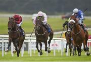 30 June 2017; Sea The Lion, right, with Ronan Whelan up, races Riven Light, with Pat Smullen up, who finished third, and Act of Valour, left, with Shane Kelly up, who finished second, on their way to winning the Irish Stallion Farms EBF 'Ragusa' Handicap during the Dubai Duty Free Irish Derby Festival 2017 on Friday at the Curragh in Kildare. Photo by Seb Daly/Sportsfile