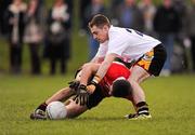 24 February 2012; Jamie O'Sullivan, UCC, is tackled by Shaun Fahey, NUIM. Irish Daily Mail Sigerson Cup Semi-Final, University College Cork v National University of Ireland Maynooth, NUIG Sportsgrounds, Galway. Picture credit: Stephen McCarthy / SPORTSFILE