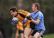 24 February 2012; Neil Collins, DCU, in action against Paul Devlin, UUJ. Irish Daily Mail Sigerson Cup Semi-Final, University of Ulster Jordanstown v Dublin City University, NUIG Sportsgrounds, Galway. Picture credit: Stephen McCarthy / SPORTSFILE