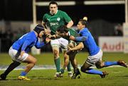 24 February 2012; Foster Horan, Ireland, with support from team-mate Jack Conan, is tackled by Pietro Ceccarelli, left, and Angelo Esposito, right, Italy. U20 Six Nations Rugby Championship, Ireland v Italy, Dubarry Park, Athlone, Co. Westmeath. Picture credit: Barry Cregg / SPORTSFILE