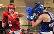 24 February 2012; Katie Taylor, Ireland, left, exchanges punches with Sandra Brugger, Switzerland. Royal Hotel, Bray, Co. Wicklow. Picture credit: David Maher / SPORTSFILE