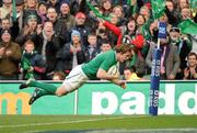 25 February 2012; Andrew Trimble, Ireland, goes over to score his side's fifth try. RBS Six Nations Rugby Championship, Ireland v Italy, Aviva Stadium, Lansdowne Road, Dublin. Picture credit: Ray McManus / SPORTSFILE