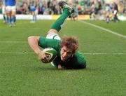 25 February 2012; Andrew Trimble, Ireland, goes over to score his side's fifth try. RBS Six Nations Rugby Championship, Ireland v Italy, Aviva Stadium, Lansdowne Road, Dublin. Picture credit: David Maher / SPORTSFILE