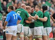 25 February 2012; Tom Court, Ireland, second from left, is congratulated by team-mates, from left, Paul O'Connell, Donnacha Ryan, Jamie Heaslip and Mike Ross after scoring his side's fourth try. RBS Six Nations Rugby Championship, Ireland v Italy, Aviva Stadium, Lansdowne Road, Dublin. Picture credit: David Maher / SPORTSFILE