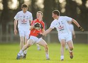 25 February 2012; Daniel O'Connor, Cork, in action against Conor Davin, left, and Bryan Nolan, Kildare. Senior All-Ireland Inter-County Football Vocational Schools Final, Kildare v Cork, Moyne-Templetuohy GAA Club, Tipperary. Picture credit: Pat Murphy / SPORTSFILE