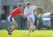 25 February 2012; Simon Mackay, Kildare, in action against Derek Canty, Cork. Senior All-Ireland Inter-County Football Vocational Schools Final, Kildare v Cork, Moyne-Templetuohy GAA Club, Tipperary. Picture credit: Pat Murphy / SPORTSFILE