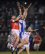 25 February 2012; John Gardiner, Cork, in action against Paudie Mahony and Paul O'Brien, right, Waterford. Allianz Hurling League, Division 1A, Cork v Waterford, Pairc Ui Rinn, Cork. Picture credit: Matt Browne / SPORTSFILE