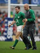25 February 2012; Ireland's Gordon D'Arcy leaves the pitch during the second half accompanied by team doctor Dr. Eanna Falvey. RBS Six Nations Rugby Championship, Ireland v Italy, Aviva Stadium, Lansdowne Road, Dublin. Picture credit: Brendan Moran / SPORTSFILE