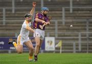 26 February 2012; Gareth Sinnott, Wexford, in action against Cormac Donnelly, Antrim. Allianz Hurling League, Division 1B, Round 1, Antrim v Wexford, Casement Park, Belfast, Co. Antrim. Picture credit: Oliver McVeigh / SPORTSFILE