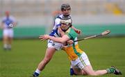 26 February 2012; Michael Verney, Offaly, in action against James Walsh, Laois. Allianz Hurling League, Division 1B, Round 1, Offaly v Laois, O'Connor Park, Tullamore, Co. Offaly. Picture credit: Brian Lawless / SPORTSFILE