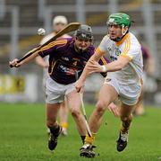 26 February 2012; Shane McNaughton, Antrim, in action against Barry Kehoe, Wexford. Allianz Hurling League, Division 1B, Round 1, Antrim v Wexford, Casement Park, Belfast, Co. Antrim. Picture credit: Oliver McVeigh / SPORTSFILE